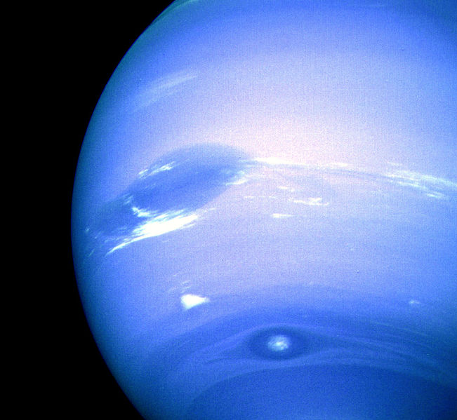 Image from the Voyager II flyby of Neptune in August 1989 (NASA). In the middle is the Great Dark Spot, accompanied by bright, white clouds that undergo rapid changes in appearance. To the south of the Great Dark Spot is the bright feature that Voyager scientists nicknamed "Scooter." Still farther south is the feature called "Dark Spot 2," which has a bright core. As each feature moves eastward at a different velocity, they are rarely aligned this way. Wind velocities near the equator are westward, reaching 1300 km/h, while those at higher latitudes are eastward, peaking at 900 km/h