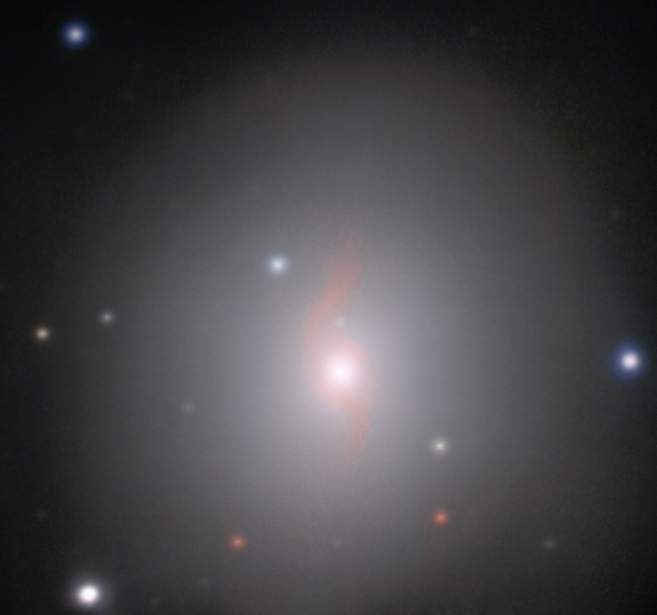 This image from the MUSE instrument on ESO’s Very Large Telescope at the Paranal Observatory in Chile shows the galaxy NGC 4993, about 130 million light-years from Earth. The aftermath of the explosion of a pair of merging neutron stars, a rare event called a kilonova can be seen just above and slightly to the left of the center of the galaxy.. Credit: ESO/J.D. Lyman, A.J. Levan, N.R. Tanvir