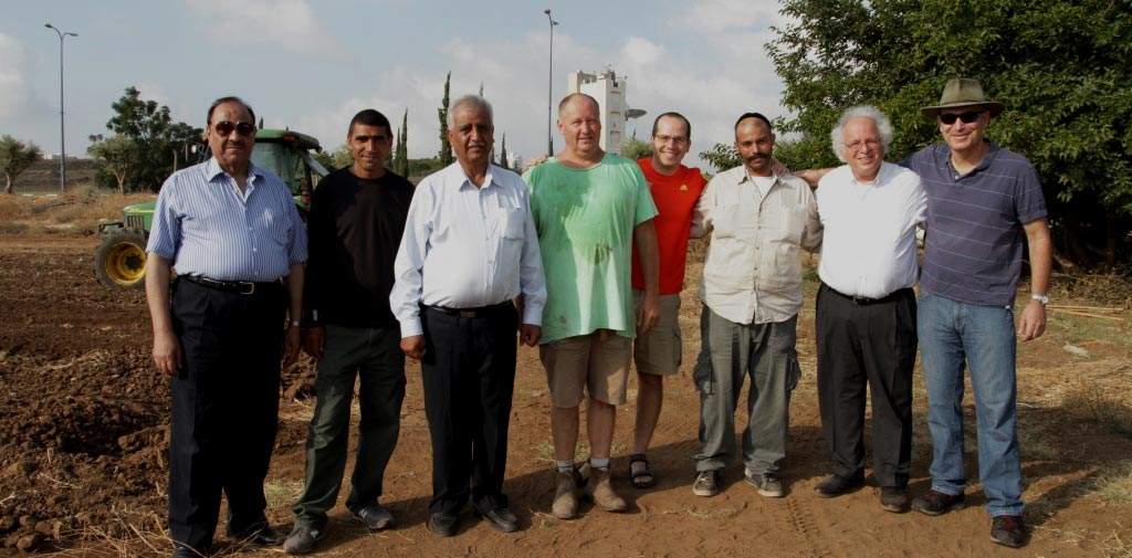 At the planting ceremony. Sanford Colb, second from right, is standing next to Mul Nof director Dr. Isaac Shariv, right