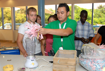 International volunteers learn about waste management