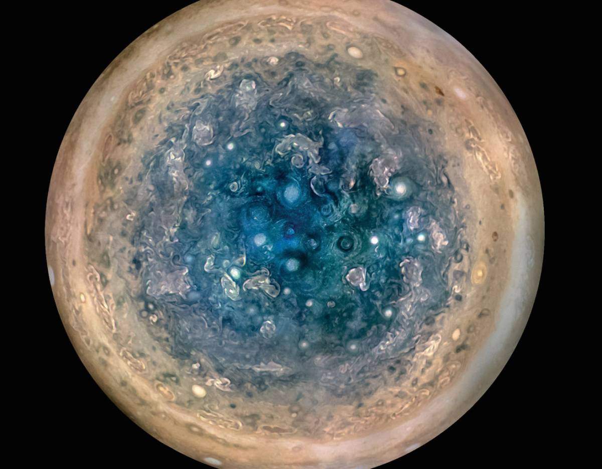 The south pole of Jupiter is seen from an altitude of 32,000 miles (52,000 kilometers) in this enhanced color mosaic of images from NASA's JunoCam. Cyclones up to 600 miles wide (1,000 km) are visible. Credit: NASA/JPL-Caltech/SwRI/MSSS/Betsy Asher Hall/Gervasio Robles SCOTT BOLTON - 3