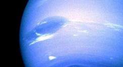 Image from the Voyager II flyby of Neptune in August 1989 (NASA). In the middle is the Great Dark Spot, accompanied by bright, white clouds that undergo rapid changes in appearance. To the south of the Great Dark Spot is the bright feature that Voyager scientists nicknamed "Scooter." Still farther south is the feature called "Dark Spot 2," which has a bright core. As each feature moves eastward at a different velocity, they are rarely aligned this way. Wind velocities near the equator are westward, reaching